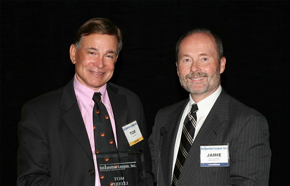 Tom Pirelli (left) receives Bellwether League Inc.'s Honoree Induction award from Chairman Jamie C. Kowalski