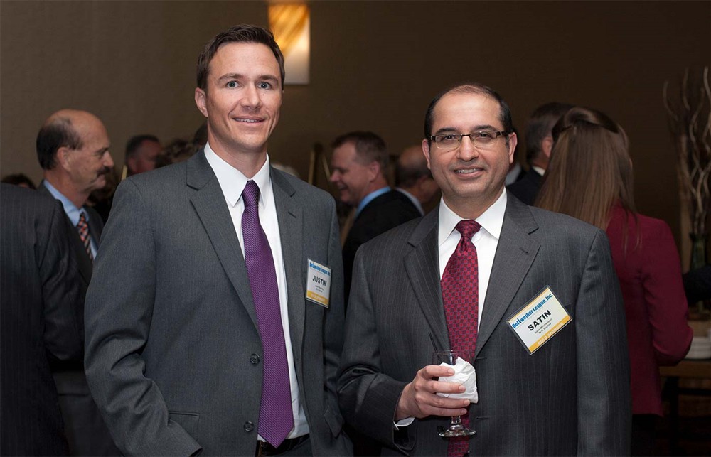 Gold Sponsor M.D. Buyline’s Justin Mourning (left) and Satin Mirchandani (right).