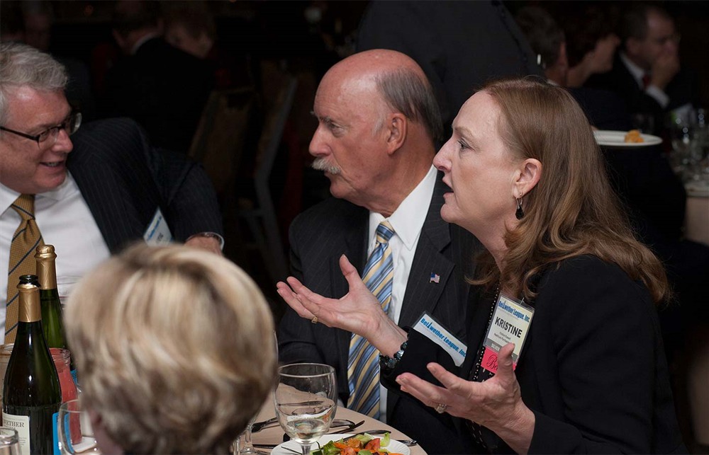 HPN’s Kristine Russell (right) shares her opinion next to Bellwether Class of 2014 Honoree Richard Perrin (center).