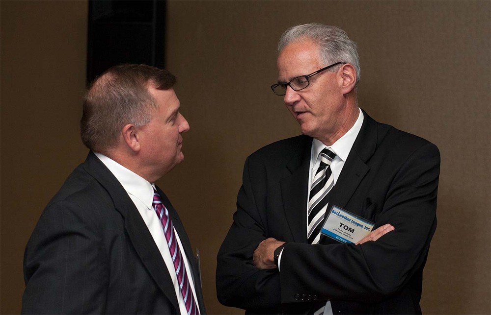 Advocate Health Care’s Tom Lubotsky (right) with Founding Sponsor Premier’s John Biggers (left).