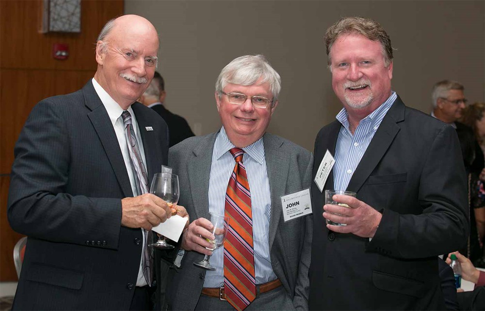 Dick Perrin (Bellwether Class of 2014), John Strong (Bellwether Class of 2011) and Champion Healthcare’s Peter Casady.