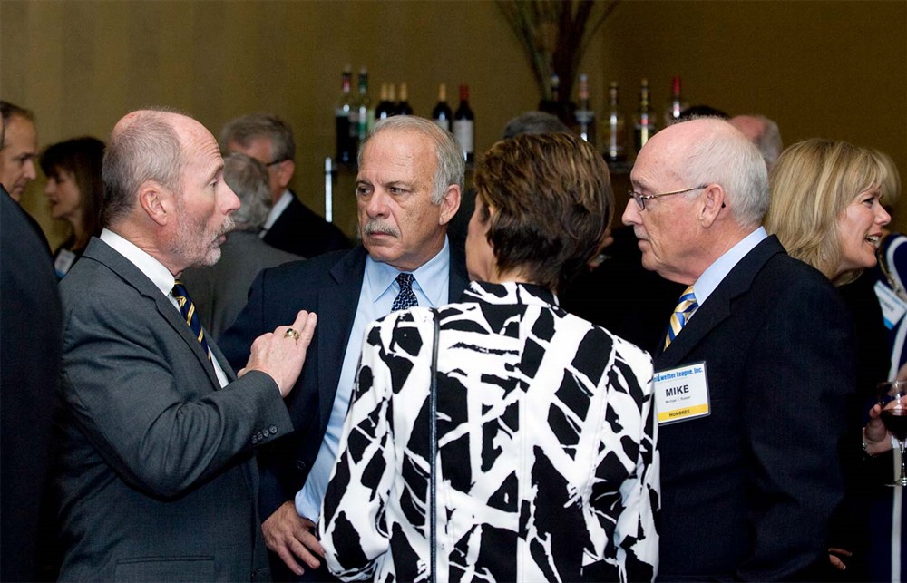 Bellwether League Inc. Co-Founder and Chairman Jamie Kowalski (far left) and Secretary Pat Carroll (left) converse with Bellwether Class of 2013’s Mike Rosser (far right) and his wife Kathy (right).