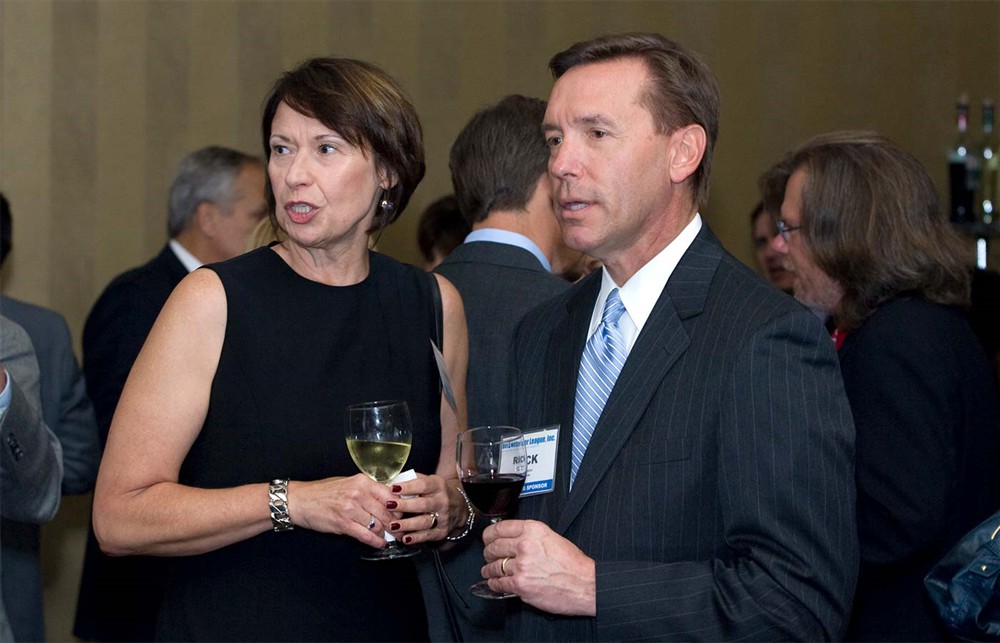 Dignity Health’s Anna Fox (left) with Founding/Platinum Sponsor Premier’s Rick Salzer (right).