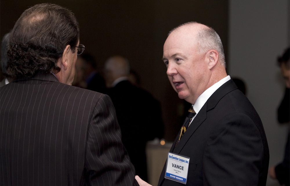 Bellwether League’s Vance Moore (right) chats with Jim Hersma (Bellwether Class of 2012)