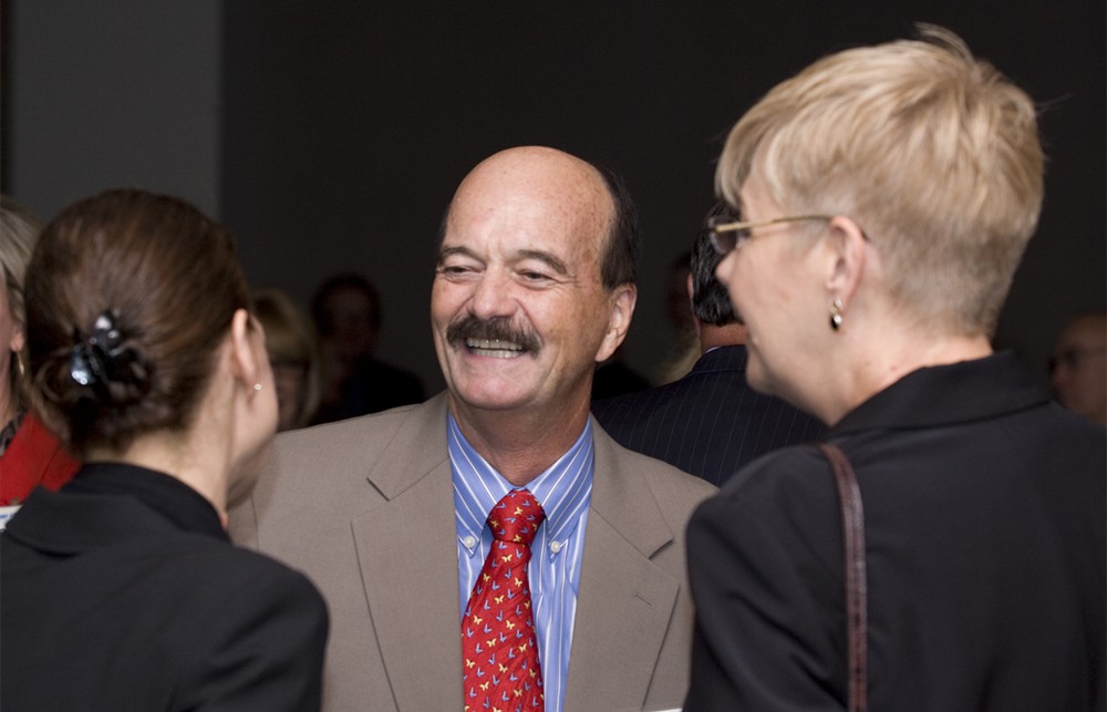 Mike Neely converses with AHRMM Executive Director Deb Sprindzunas (left) and AHRMM President Bev Slate (right)