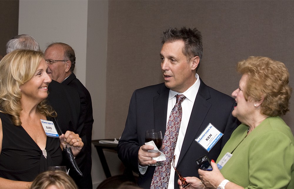 Cooperative Services of Florida’s Ken Greco (center) speaks with LeeSar’s Barb Adams (left) and Linda Simpson (right)