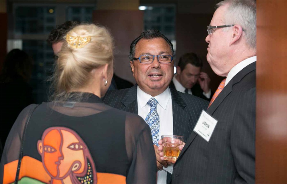 Innovative Health’s Rick Ferreira (center) with Bellwether League Chairman Emeritus John Gaida (right) and GHX’s Karen Conway (left, back to camera).