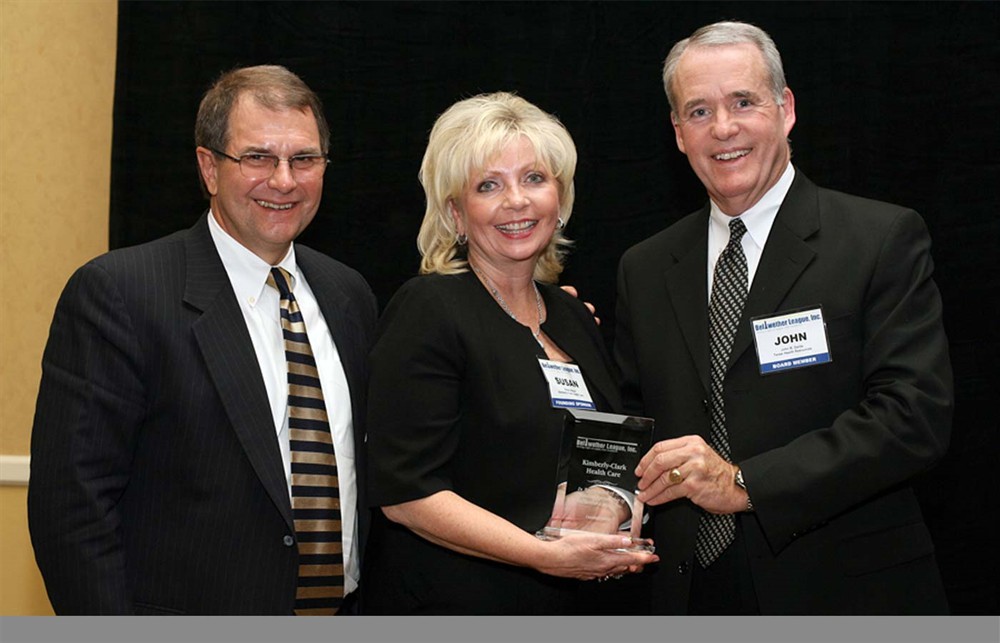 Bellwether League Inc. Founding Sponsor Kimberly-Clark Health Care's Keith Kuchta (left) and Susan Meyer with John B. Gaida