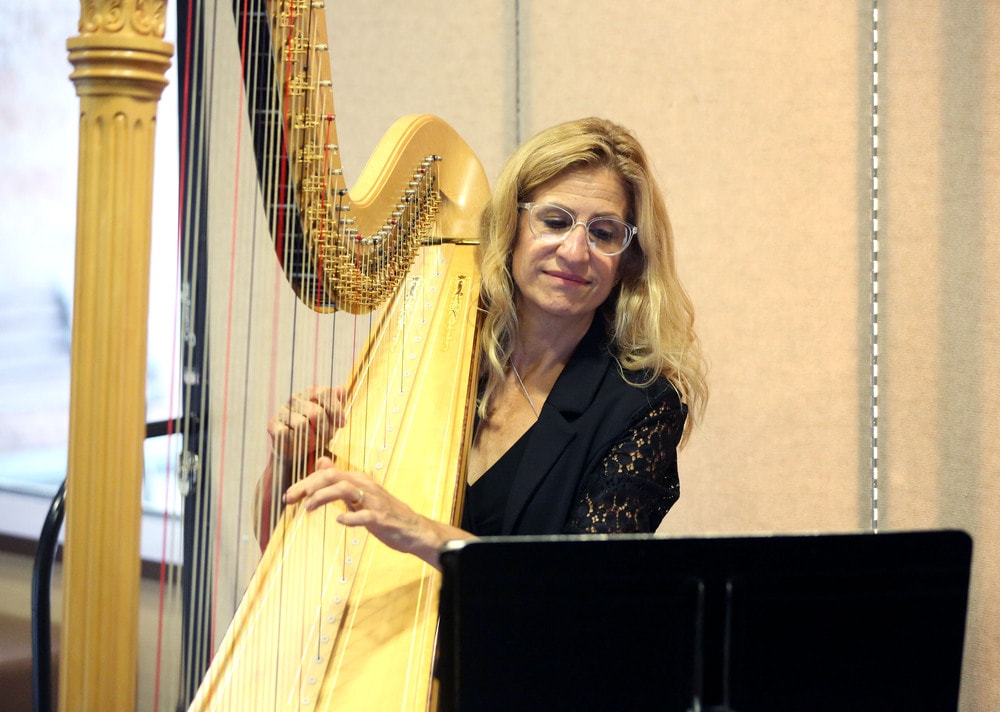 Harpist Laura Utley returns