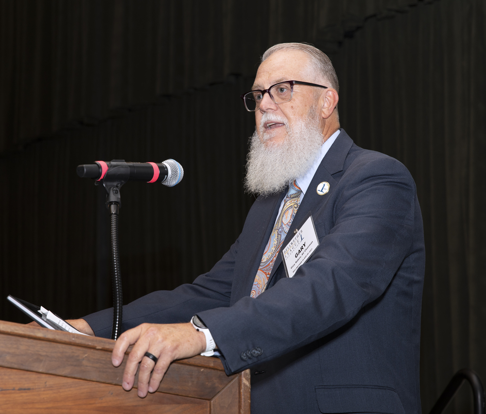 BLF Advisory Council Chaiman Gary Rakes introduces the second Bellwether Honoree for induction