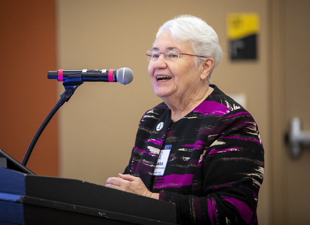 Strain introduces the Collegiate Capstone Project speakers and Leadership Roundtable