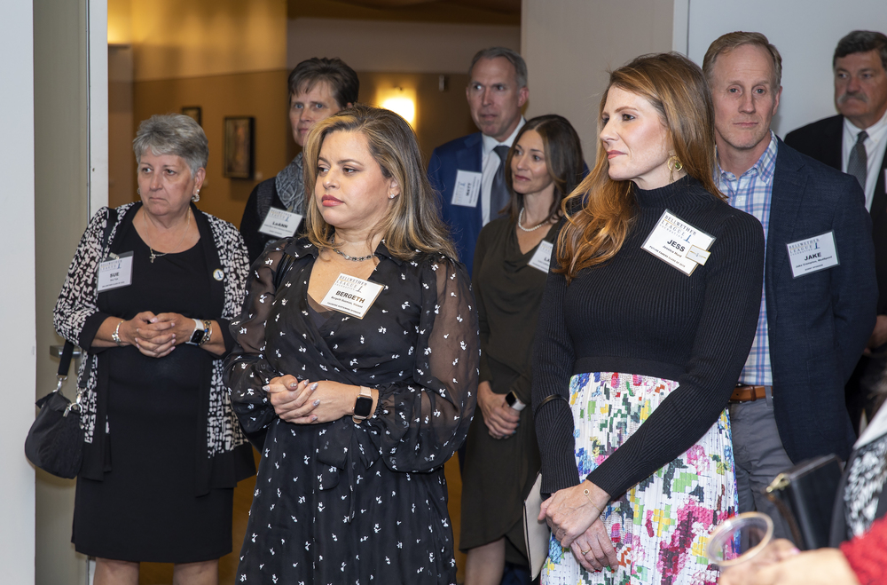 BLFIRE17 attendees listen to announcements during the VIP Reception.