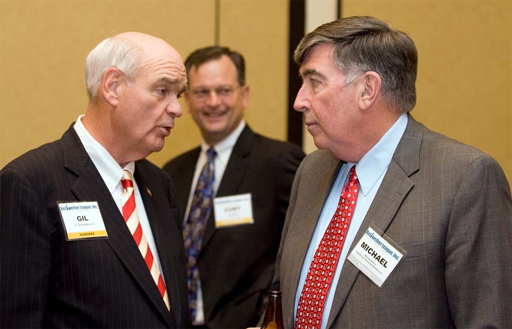 Association for Healthcare Resource & Materials Management’s Al Brown (center) talks with Lee C. Boergadine (right) (Bellwether Class of 2008).