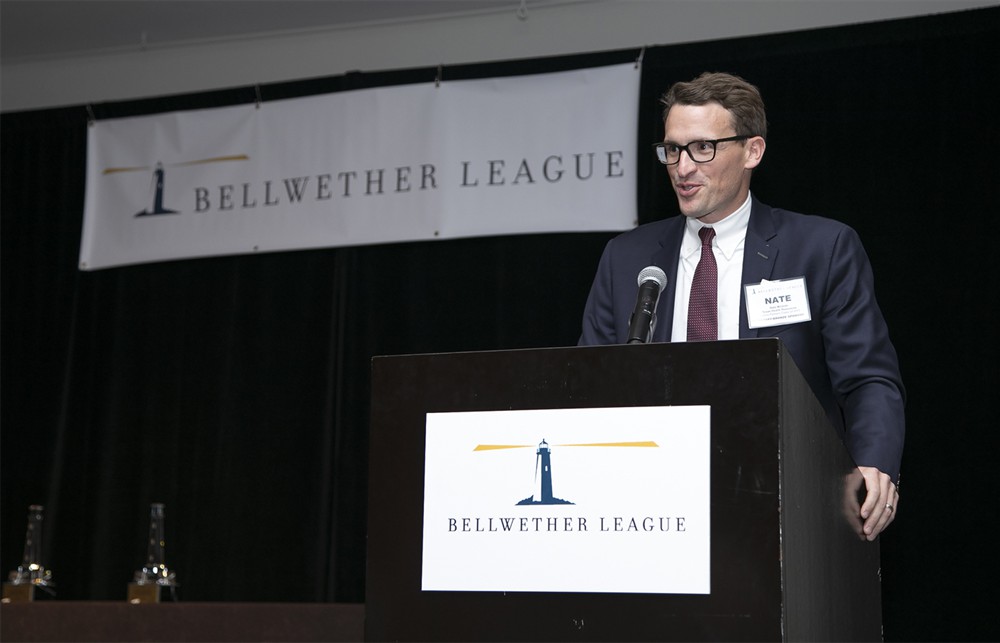 Bellwether League Secretary Nate Mickish introduces former boss John Gaida (Bellwether Class of 2018) with a quip or two