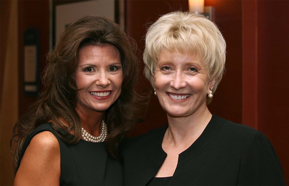 Robynn Price-Zehnder from BLI Corporate Sponsor NDC with Lana Stover, wife of Bellwether Class of 2009 Inductee James E. Stover