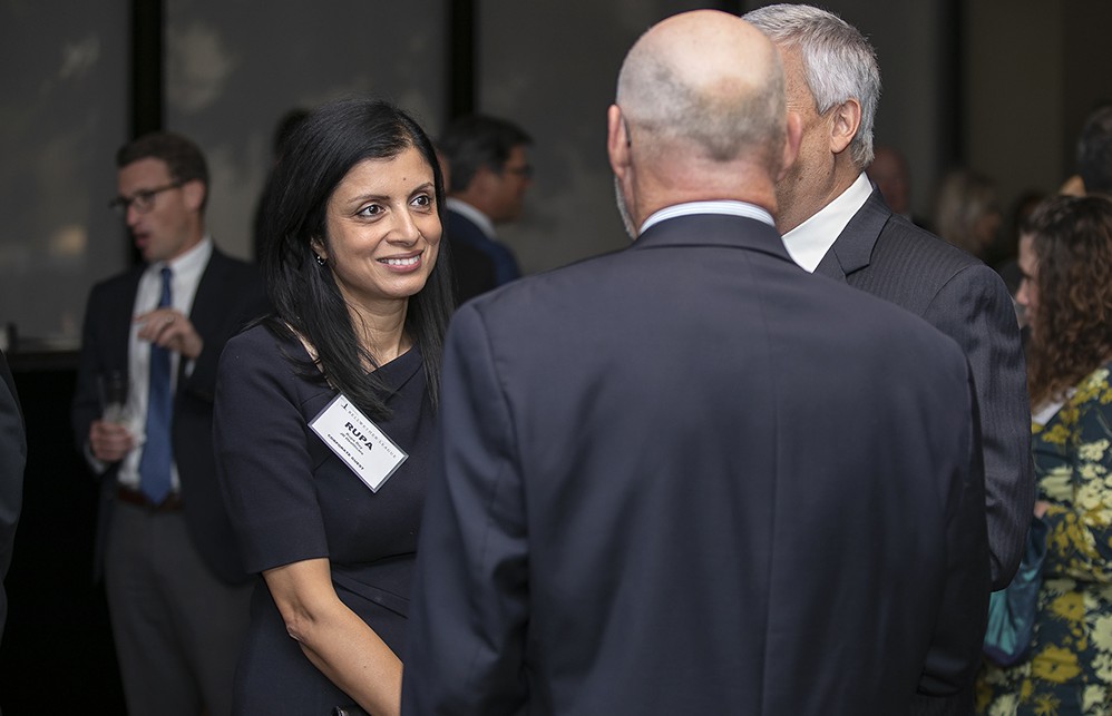 JR Healthcare’s Rupa Roy with Kevin Stout (back to camera), Medical Device Industry Supply Chain Council.
