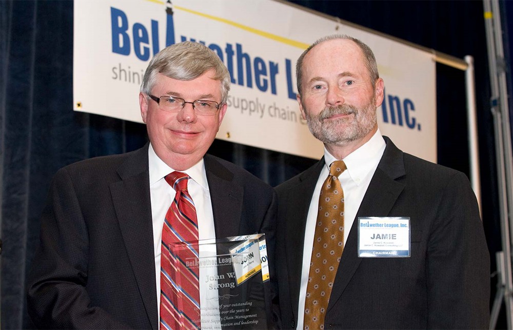 Bellwether Class of 2011 Inductee John W. Strong with Jamie C. Kowalski.