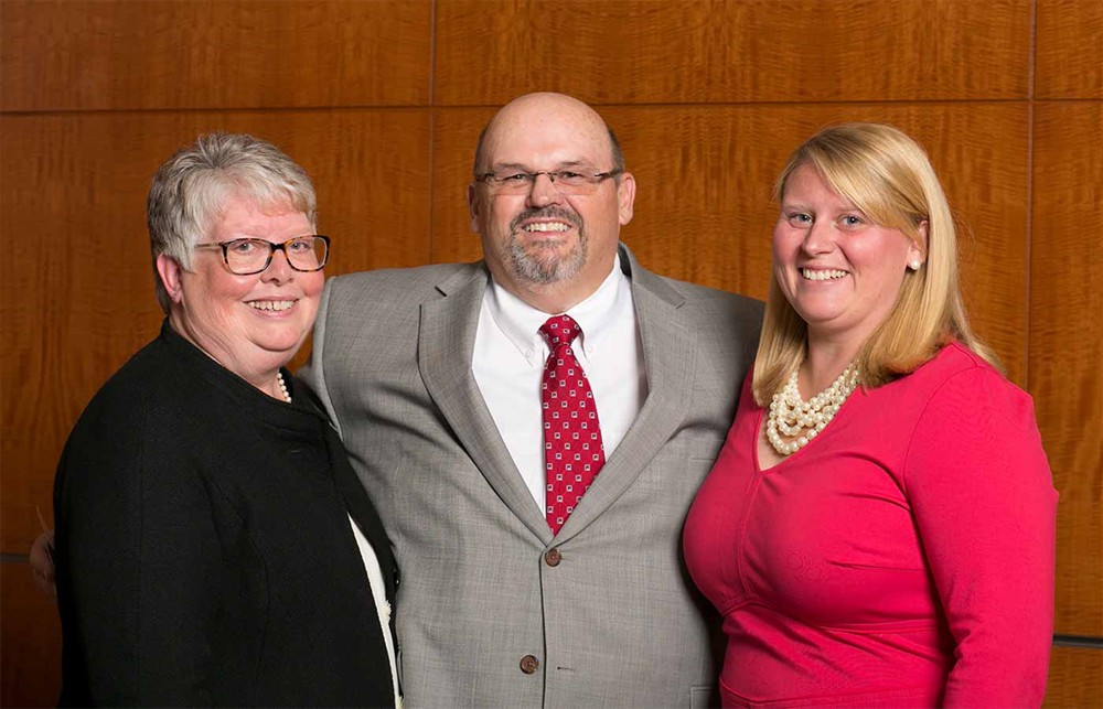 The Oliver Family: Bellwether Class of 2017 Inductee James Oliver (center) with wife Deb Oliver (left) and daughter Ashley Oliver (right).